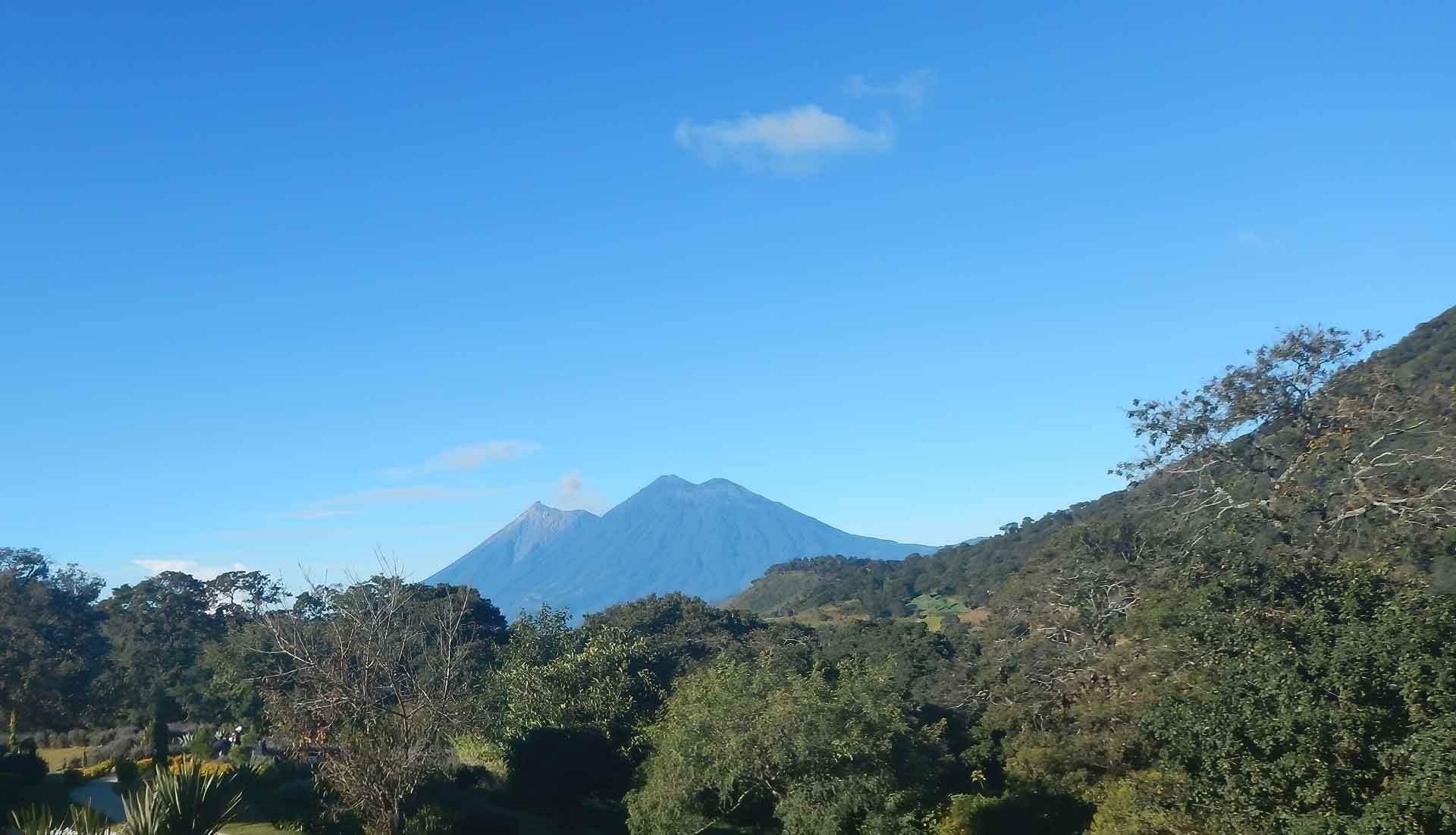 Volcanoes Fuego and Acatenango surrounding Antigua Guatemala, observed during a hike along the stunning hiking trails in Guatemala.